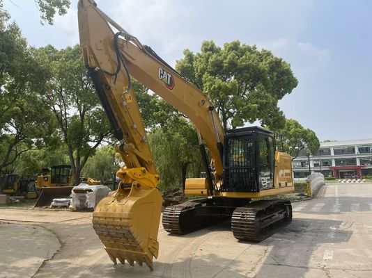 Excavadora Caterpillar 320GC em bom estado, usada, com engate hidráulico