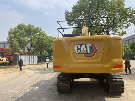 Excavadora Caterpillar 320GC em bom estado, usada, com engate hidráulico
