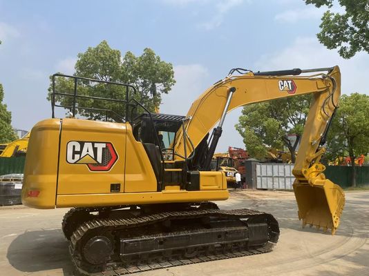 Excavadora Caterpillar 320GC em bom estado, usada, com engate hidráulico