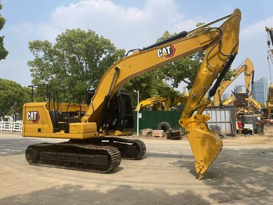 Excavadora Caterpillar 320GC em bom estado, usada, com engate hidráulico
