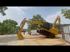 Excavadora Caterpillar 320GC em bom estado, usada, com engate hidráulico